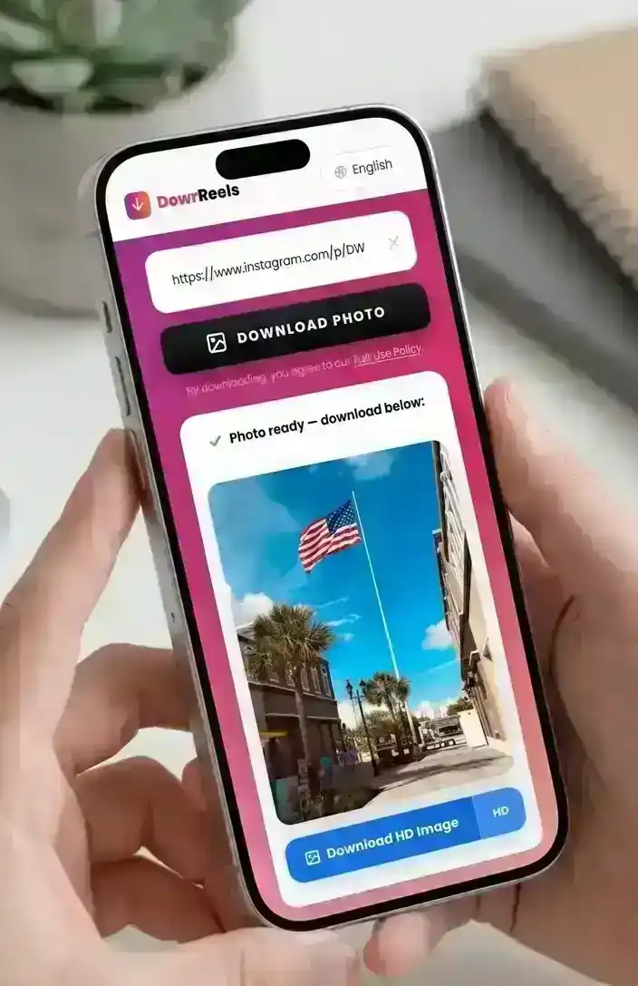 Step 3 — Hands holding iPhone showing DownReels result with Download HD Image button